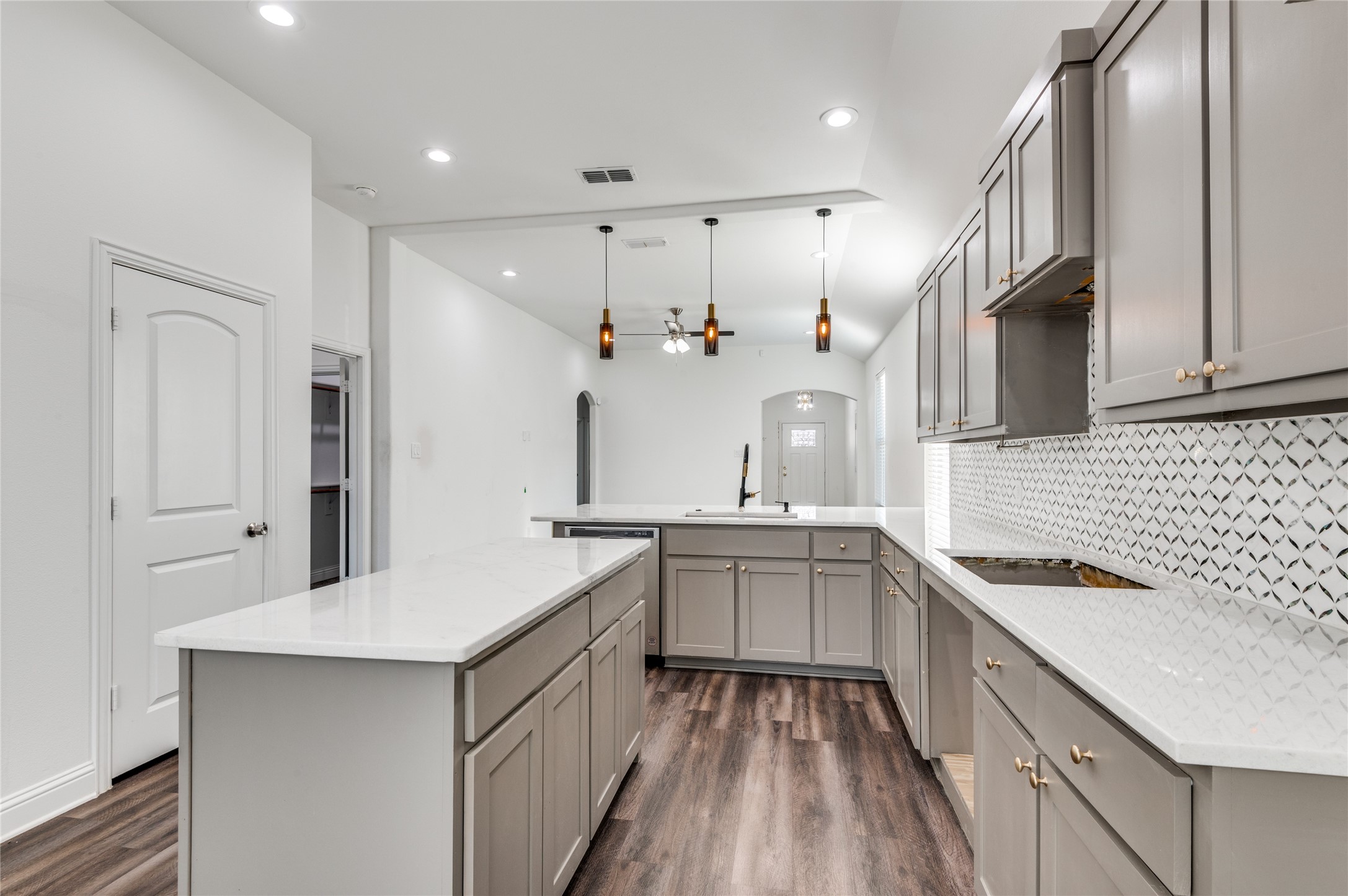 2255 Exeter Avenue Dallas, TX 75216 - Photo 19 of 30 a kitchen with a sink stainless steel appliances and cabinets