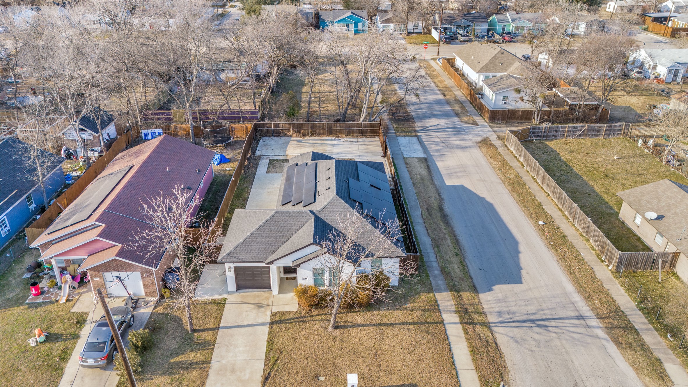 2255 Exeter Avenue Dallas, TX 75216 - Photo 26 of 30 a view of residential houses with outdoor space