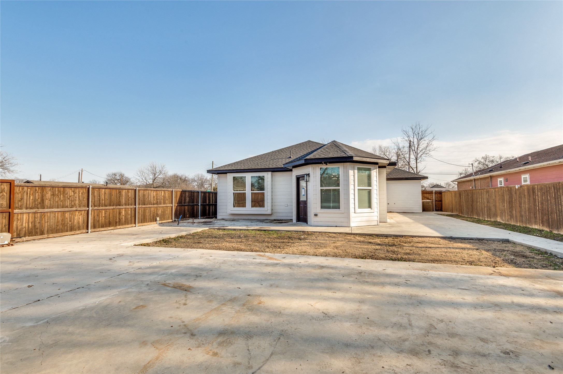 2255 Exeter Avenue Dallas, TX 75216 - Photo 5 of 30 a view of a house with a patio