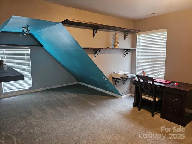 a room with furniture and a window