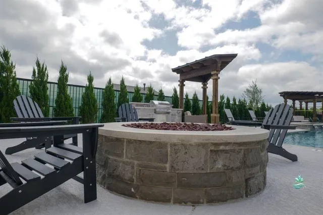 a view of a swimming pool with a patio