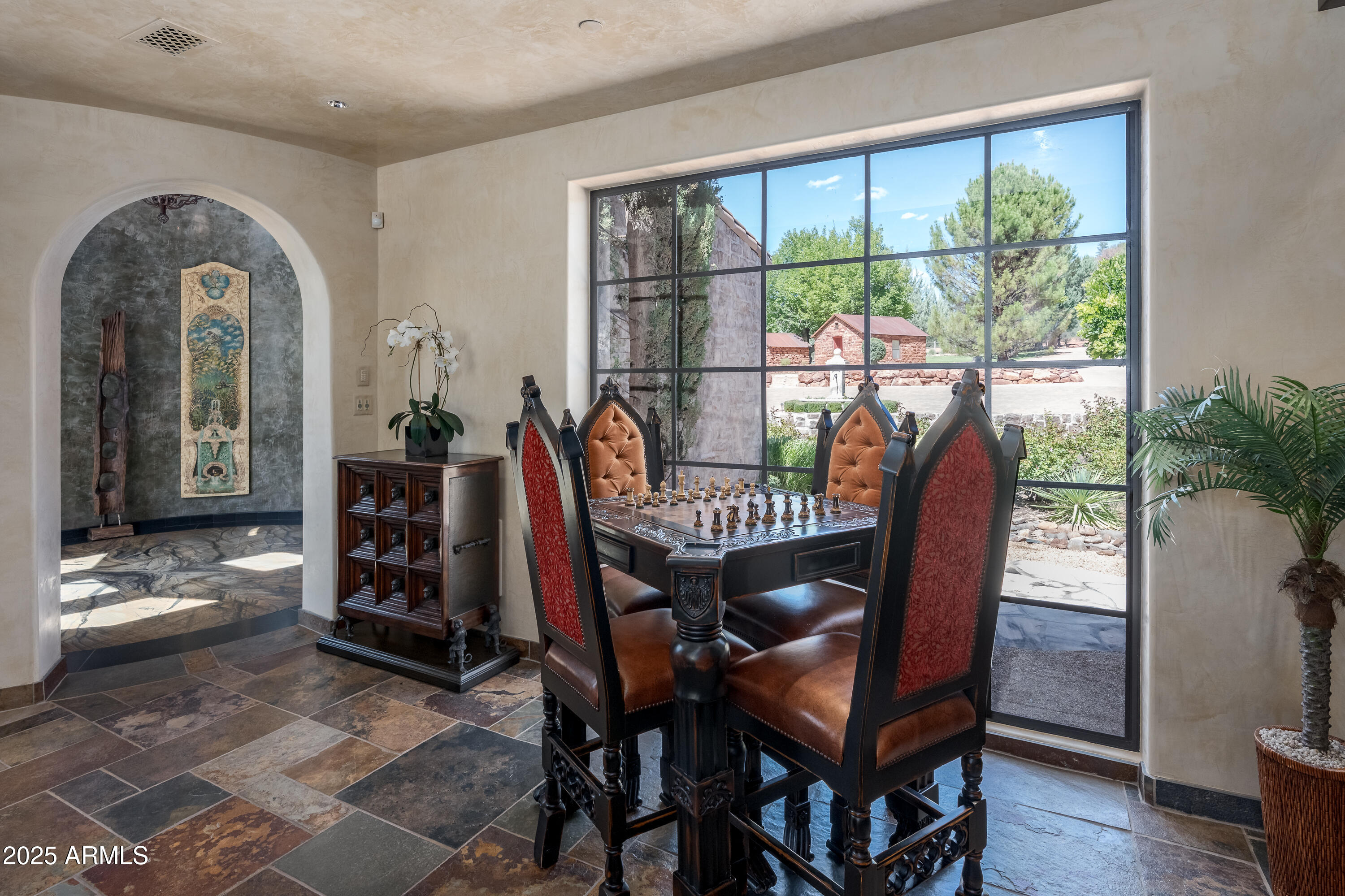 330 Eagle Mountain Ranch Road Sedona, AZ 86336 - Photo 12 of 87 a view of a dining room with furniture window and wooden floor