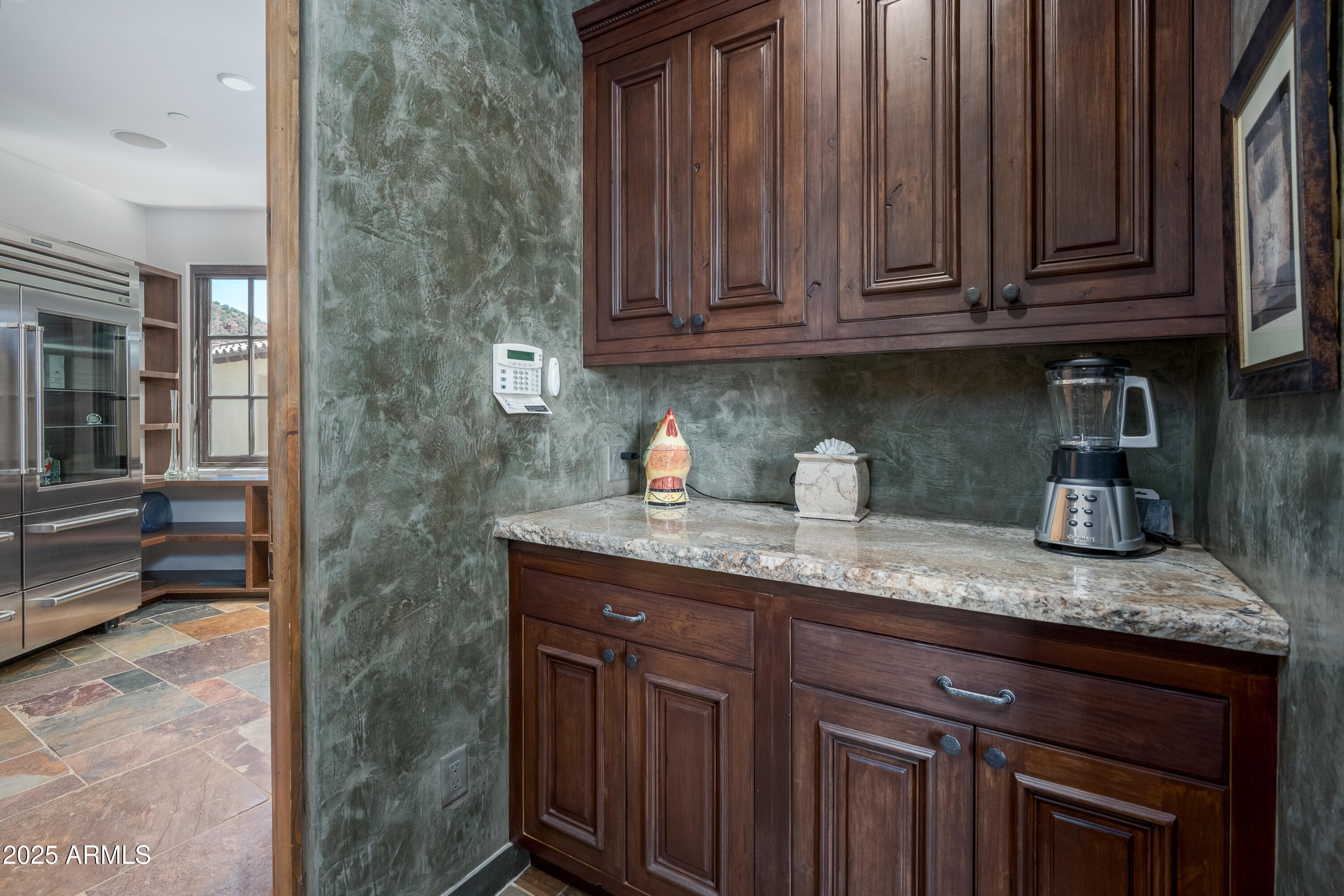 330 Eagle Mountain Ranch Road Sedona, AZ 86336 - Photo 20 of 87 a kitchen with granite countertop stainless steel appliances stove microwave and cabinets