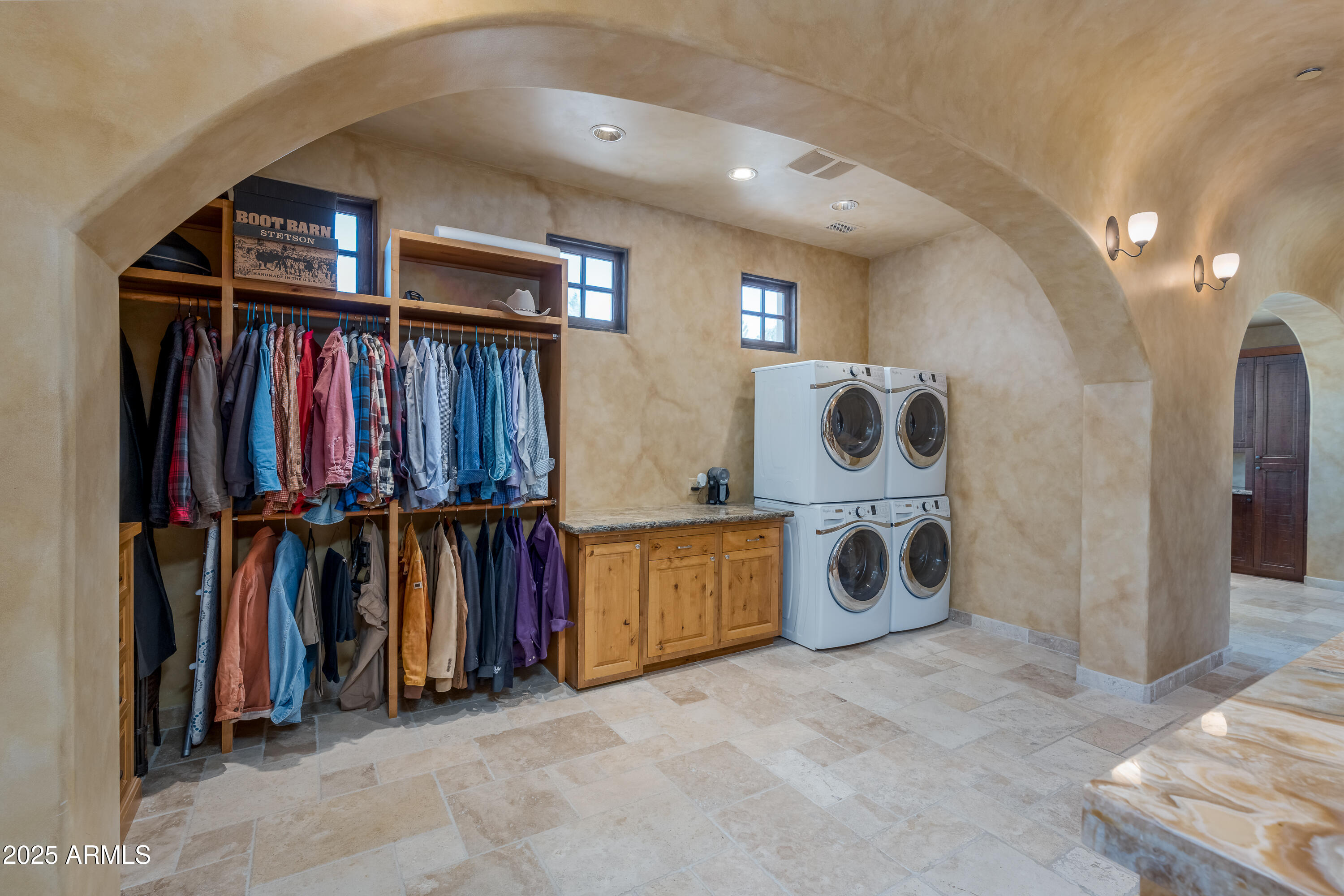 330 Eagle Mountain Ranch Road Sedona, AZ 86336 - Photo 35 of 87 a view of walk in closet with clothes and shoes