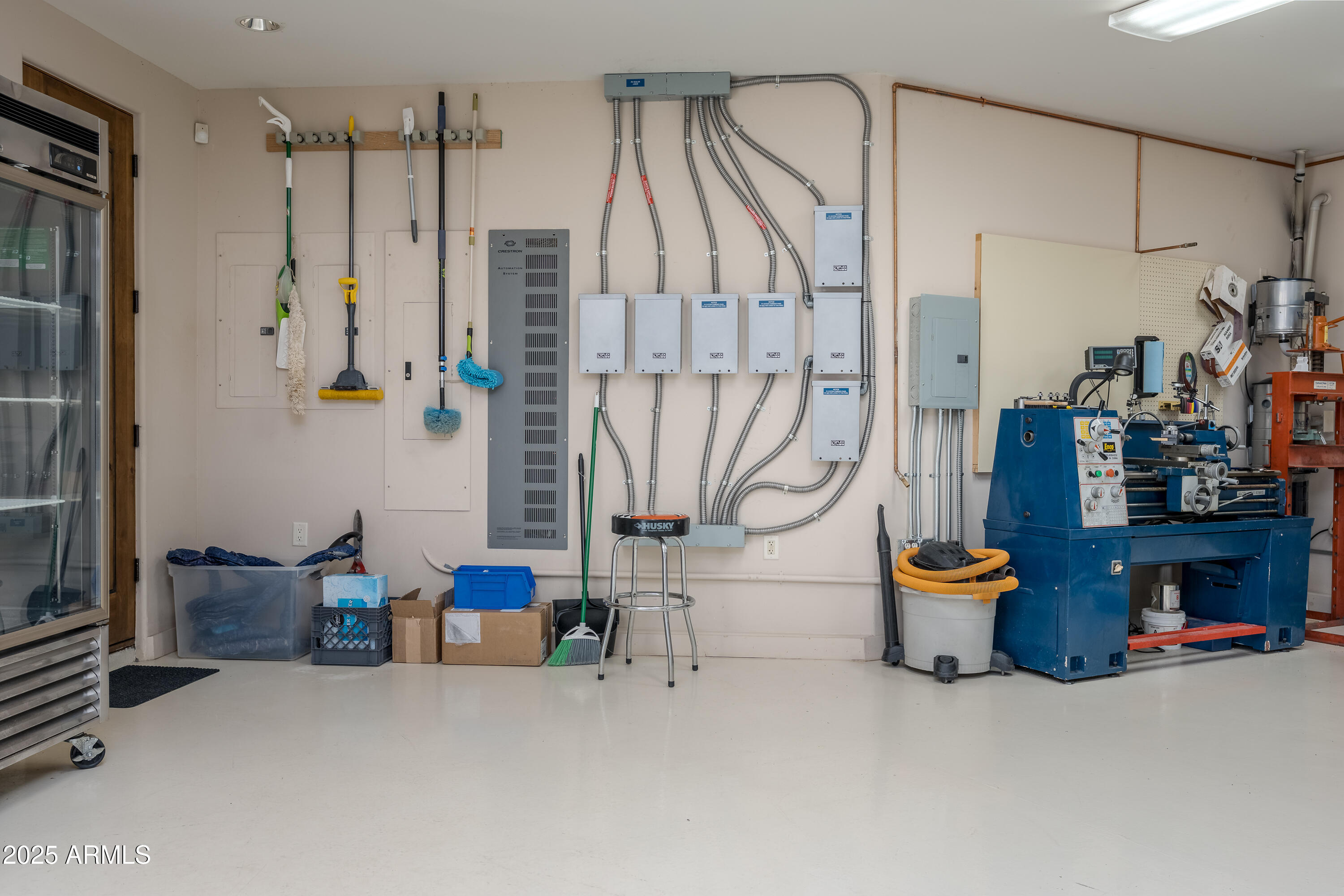 330 Eagle Mountain Ranch Road Sedona, AZ 86336 - Photo 48 of 87 a room with lots of white furniture and a chandelier