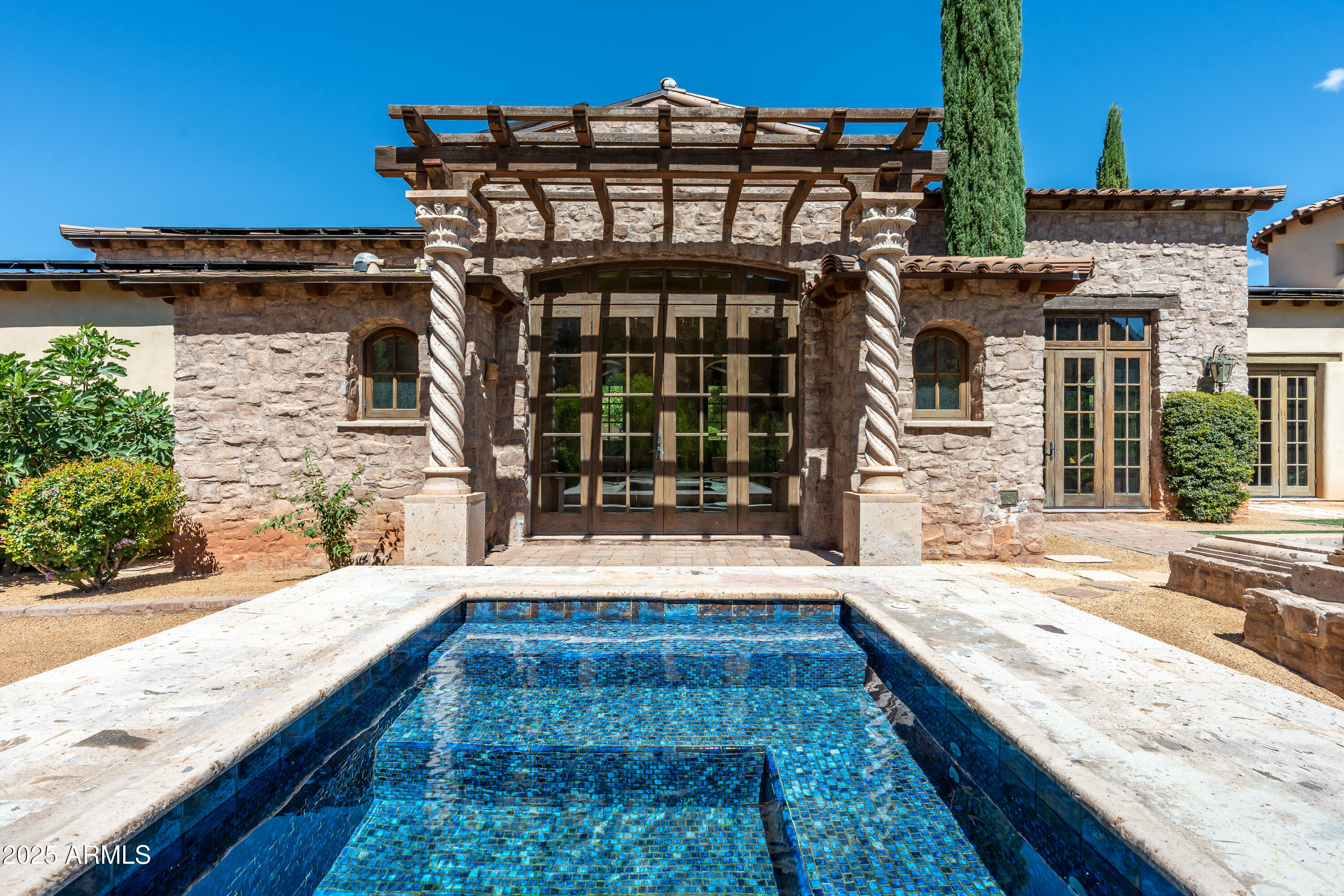 330 Eagle Mountain Ranch Road Sedona, AZ 86336 - Photo 56 of 87 front view of a house with a yard