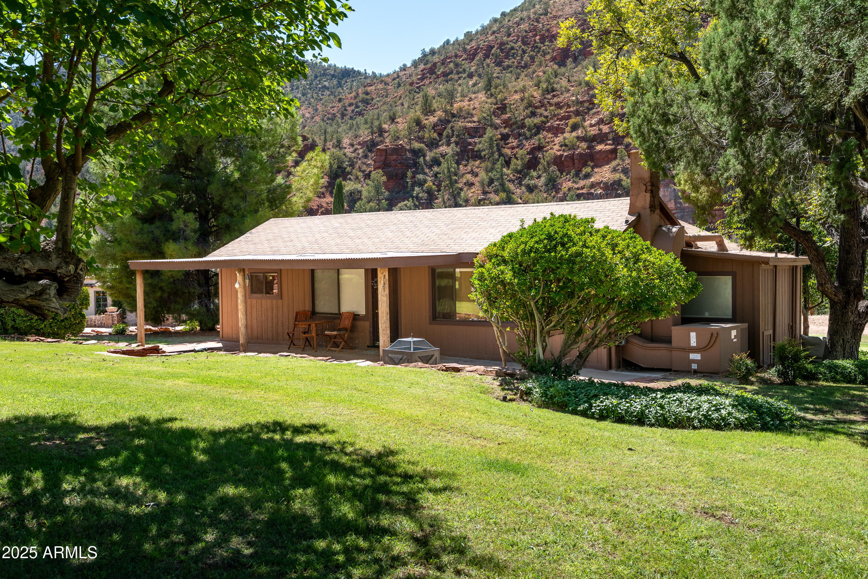 330 Eagle Mountain Ranch Road Sedona, AZ 86336 - Photo 82 of 87 a view of a house with a yard and sitting area