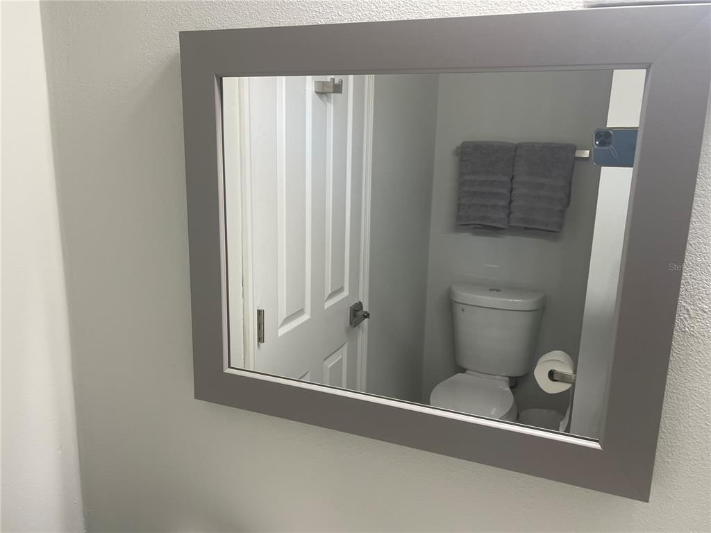 21 Post View Drive Palm Coast, FL 32164 - Photo 13 of 28 a bathroom with a toilet