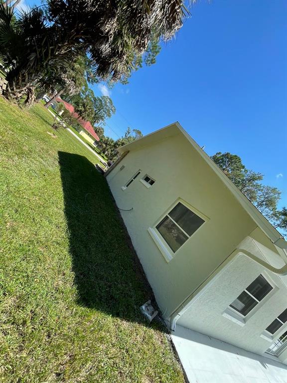 21 Post View Drive Palm Coast, FL 32164 - Photo 26 of 28 a view of a yard with an outdoor space