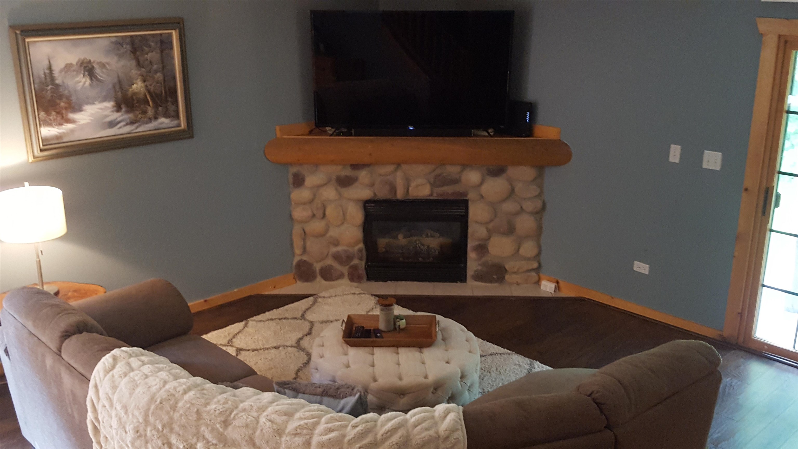 2643 Highway 178, Unit Q1 Utica, IL 61373 - Photo 11 of 21 a living room with furniture and a fireplace