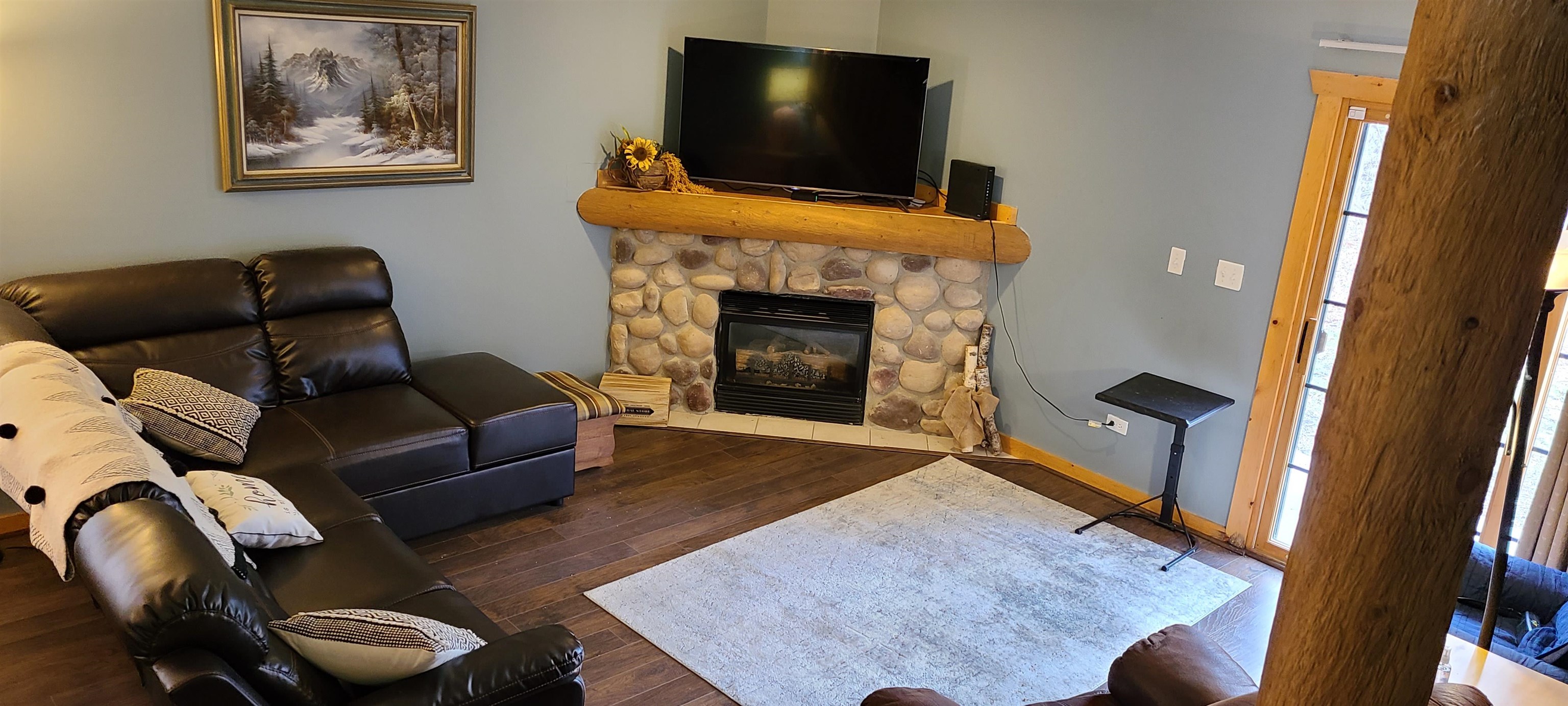 2643 Highway 178, Unit Q1 Utica, IL 61373 - Photo 20 of 21 a living room with furniture and a fireplace