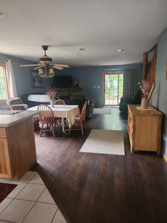 a living room with a couch and a window