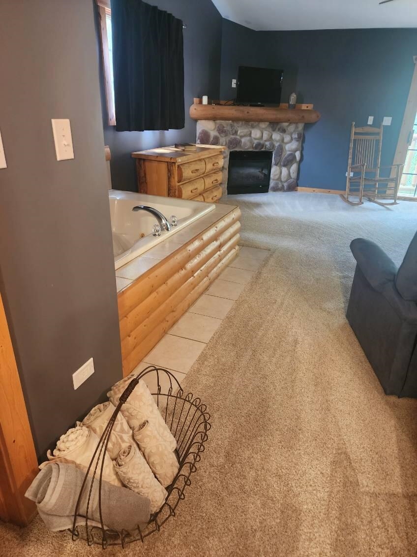 2643 Highway 178, Unit Q1 Utica, IL 61373 - Photo 5 of 21 a living room with furniture and a fireplace