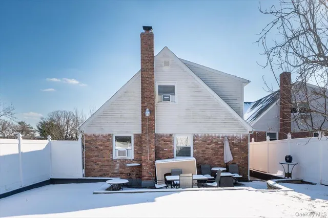 a front view of a house with garage