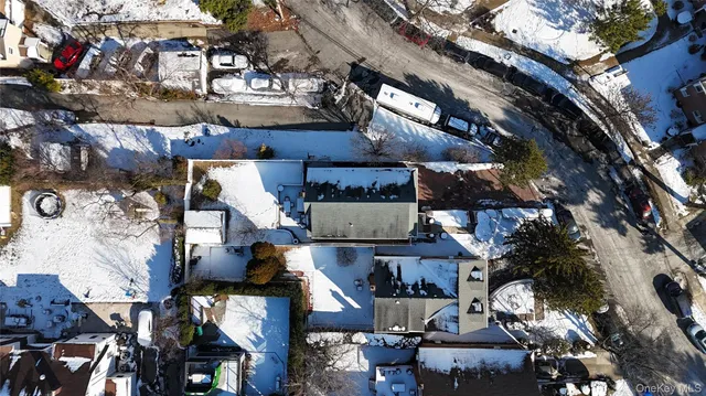 an aerial view of houses with outdoor space