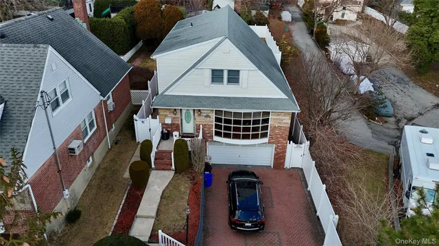 a view of multiple house with large windows