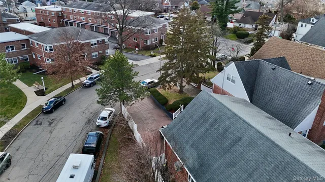 an aerial view of a house with outdoor space
