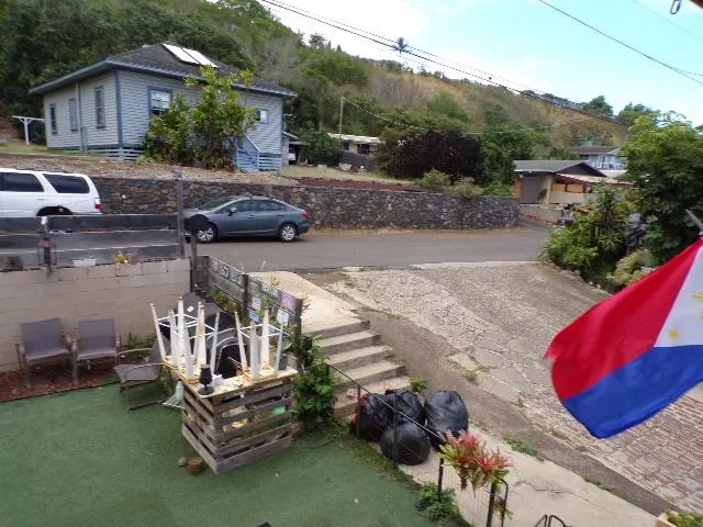 a view of backyard with outdoor seating