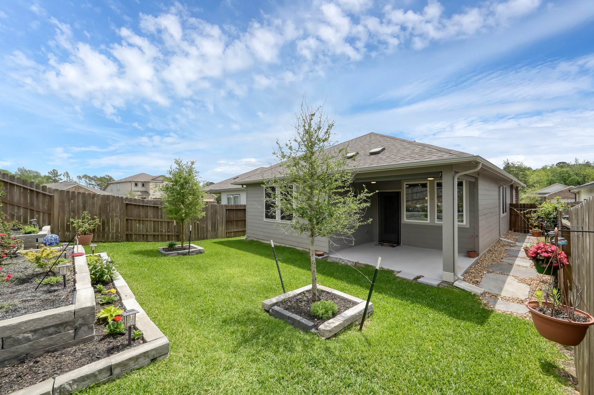 372 Sunrise Rnch Drive Montgomery, TX 77316 - Photo 21 of 32 This charming backyard is perfect for outdoor relaxation and entertaining!