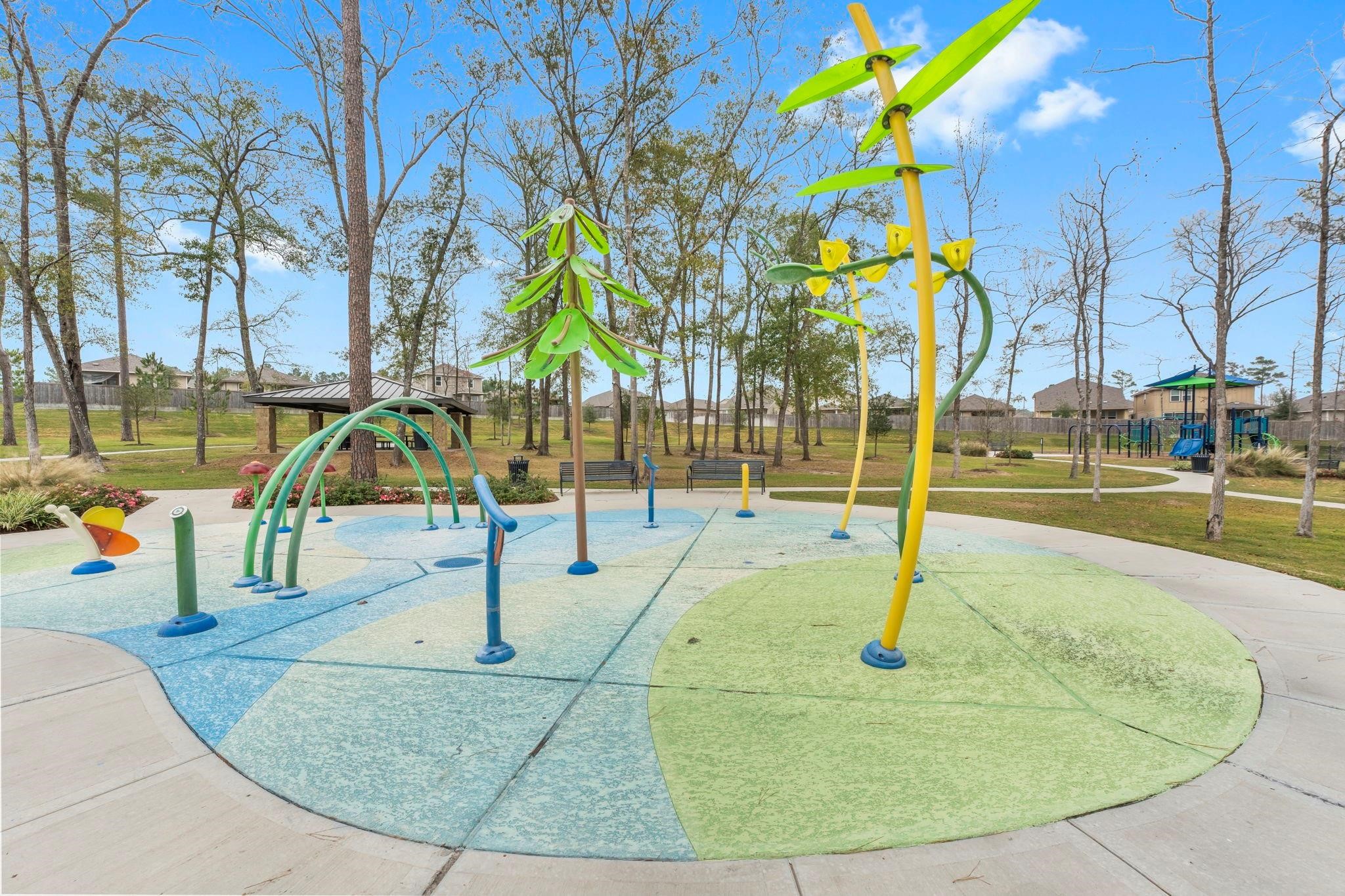 372 Sunrise Rnch Drive Montgomery, TX 77316 - Photo 26 of 32 Another amenity is this vibrant community splash pad with playful water features