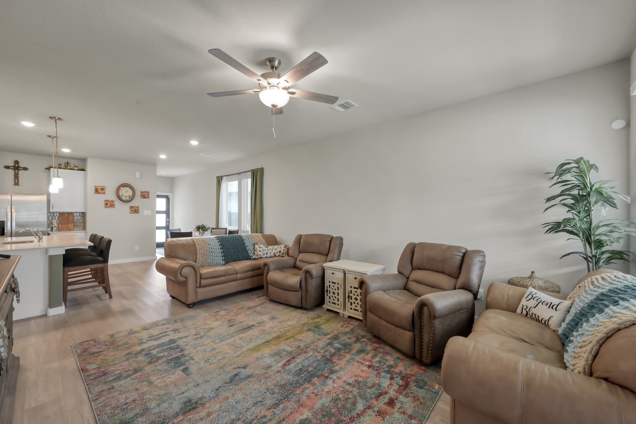 372 Sunrise Rnch Drive Montgomery, TX 77316 - Photo 8 of 32 It seamlessly flows into the kitchen and dining