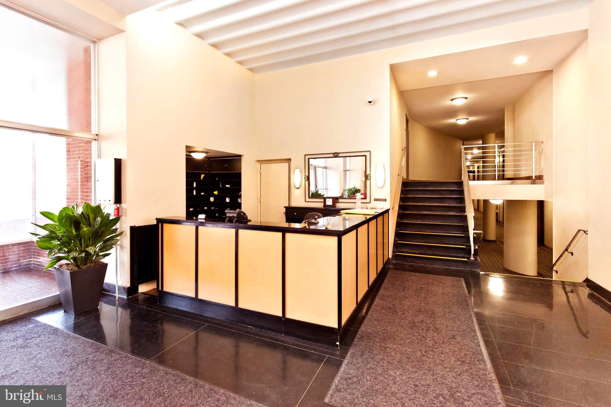 2500 Q Street Northwest, Unit 727 Washington, DC 20007 - Photo 30 of 42 24 Front Desk in Lobby