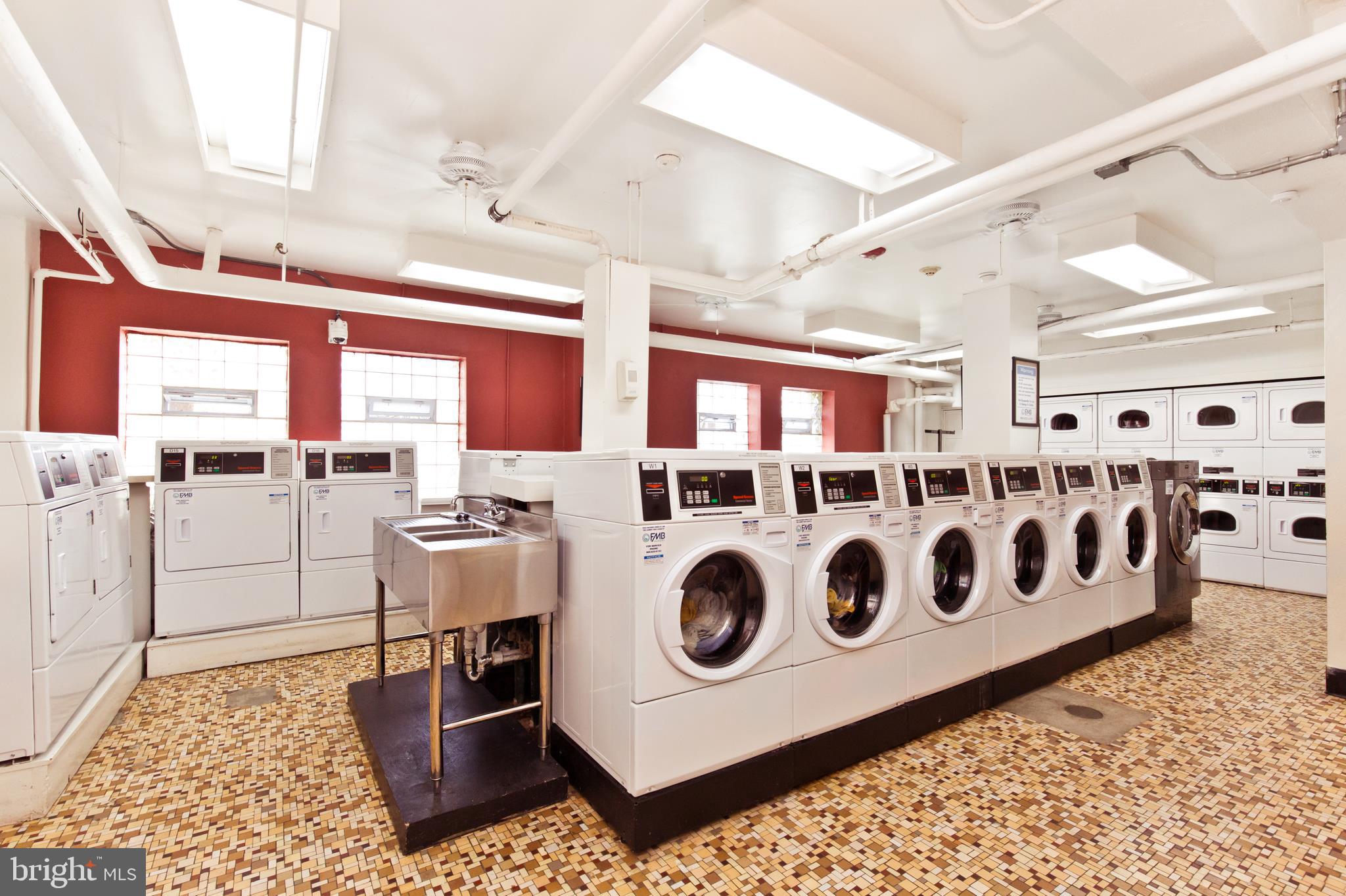 2500 Q Street Northwest, Unit 727 Washington, DC 20007 - Photo 37 of 42 Laundry room has many machines and options