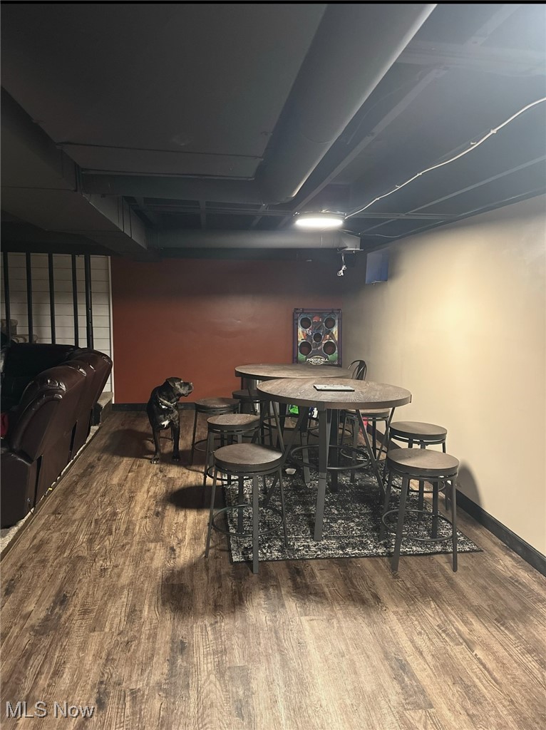 2405 Irish Ridge Road Philo, OH 43771 - Photo 15 of 18 Dining space featuring wood finished floors and baseboards
