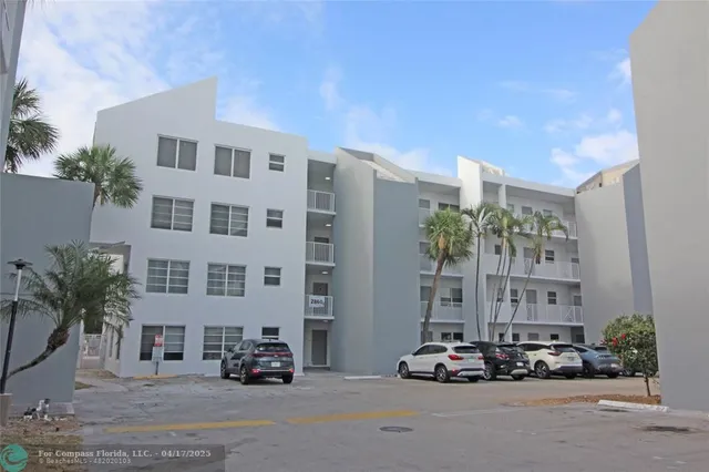 a car parked in front of a building