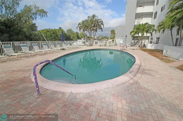 a view of outdoor space yard and swimming pool