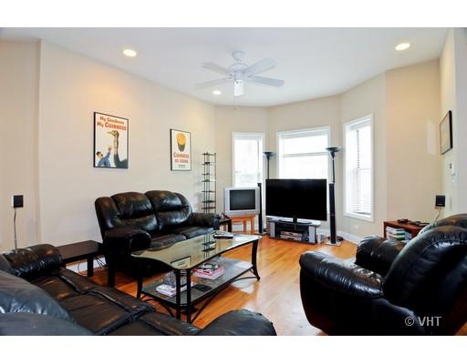 3357 North Seminary Avenue, Unit 1 Chicago, IL 60657 - Photo 2 of 10 a living room with furniture and a flat screen tv