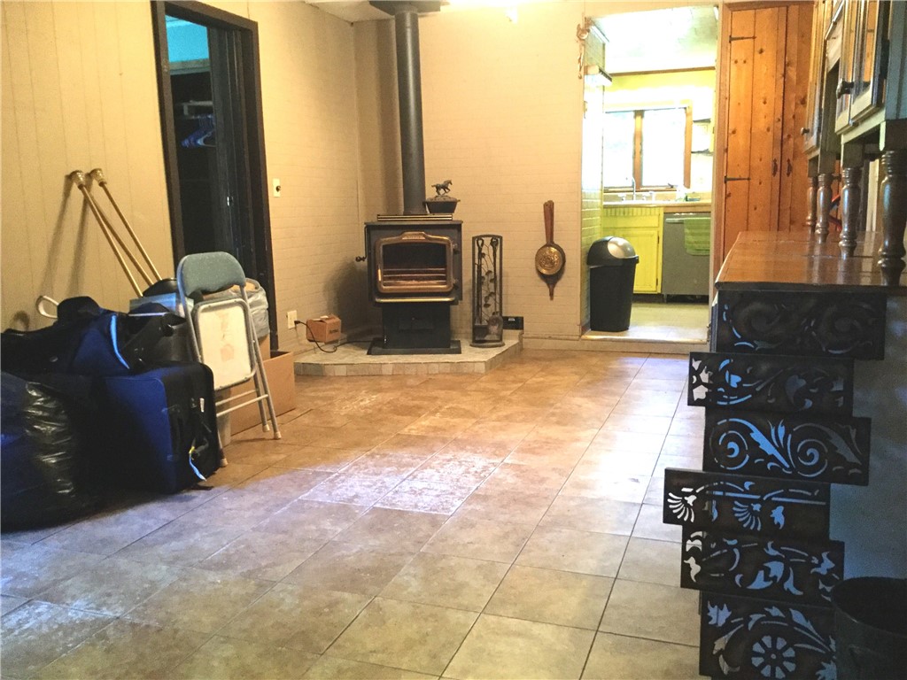 15407 East Lee Road Barre, NY 14470 - Photo 12 of 39 Dining Area with Coal Burning Stove