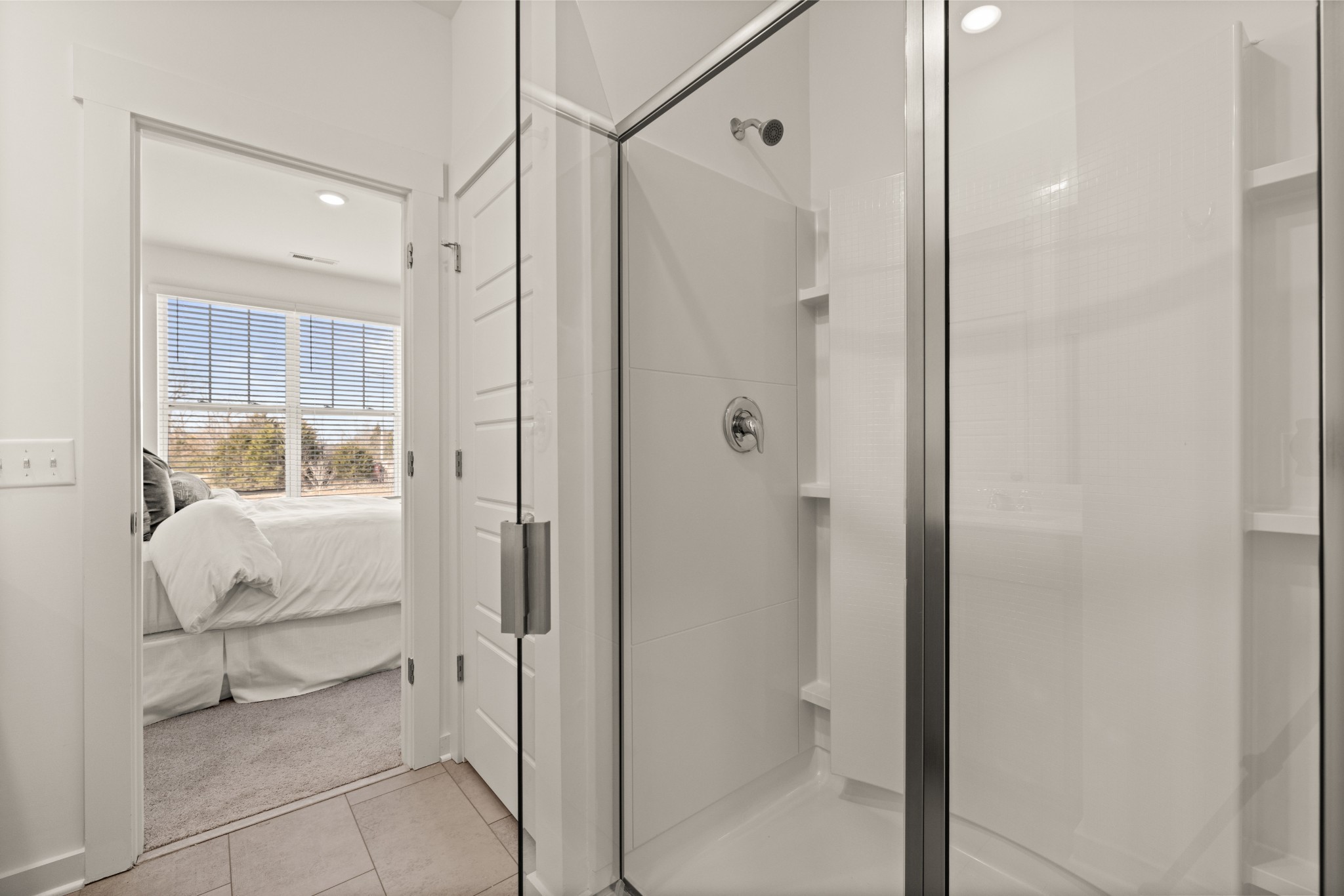550 Trinity Way Spring Hill Spring Hill, TN 37174 - Photo 17 of 17 a bathroom with a glass shower door and a sink
