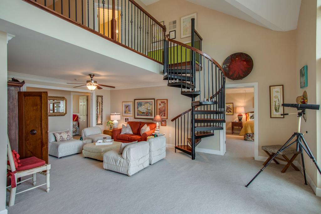 7100 Dale Ridge Road Lancaster, TN 38569 - Photo 11 of 29 From the living room, you can access the balcony, upstairs loft, dining room, or owners' suite!