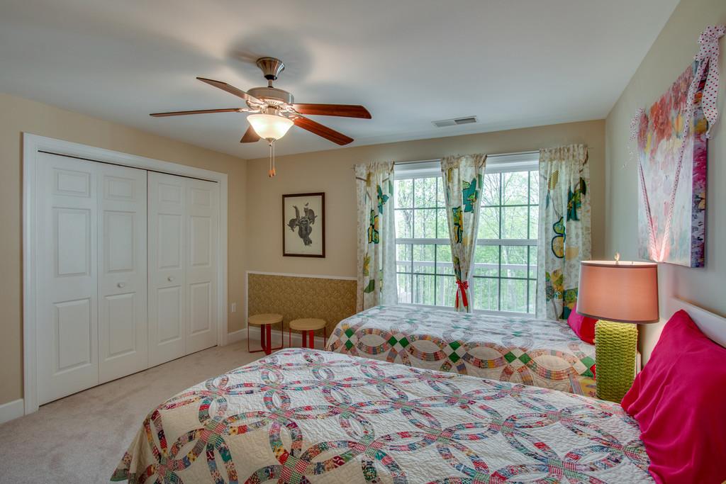 7100 Dale Ridge Road Lancaster, TN 38569 - Photo 17 of 29 Guest bedroom #1 features lovely windows, plenty of space, and a large closet!