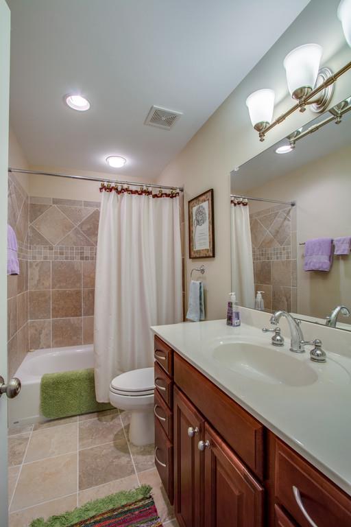 7100 Dale Ridge Road Lancaster, TN 38569 - Photo 19 of 29 This hall bath for Guest Room # 1 and # 2 boasts lovely tile and elevated vanity...