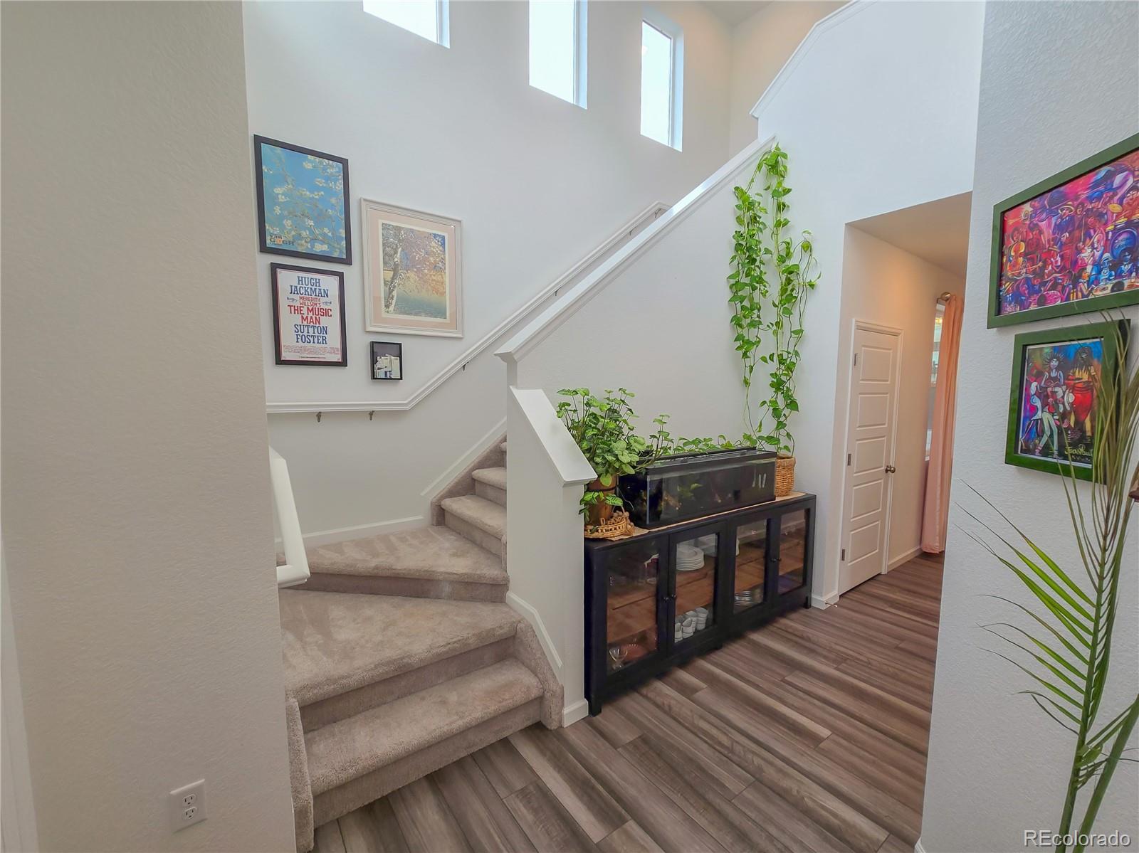 2084 Chambers Road Brighton, CO 80601 - Photo 9 of 50 a view of entryway and kitchen