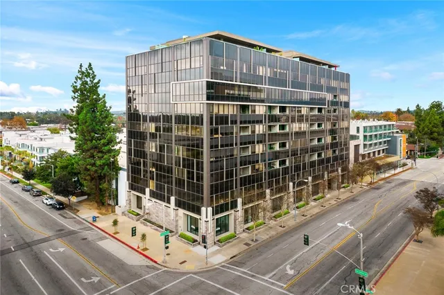 a view of a balcony with a potted plant