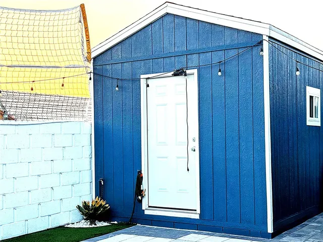 a view of a swimming pool with a patio