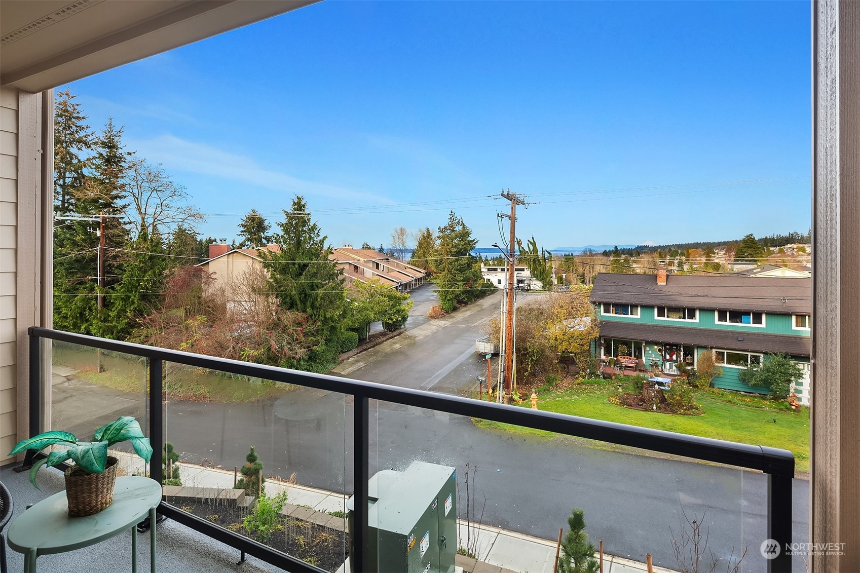 546 Paradise Lane, Unit A202 Edmonds, WA 98020 - Photo 11 of 30 a view of a balcony with chairs