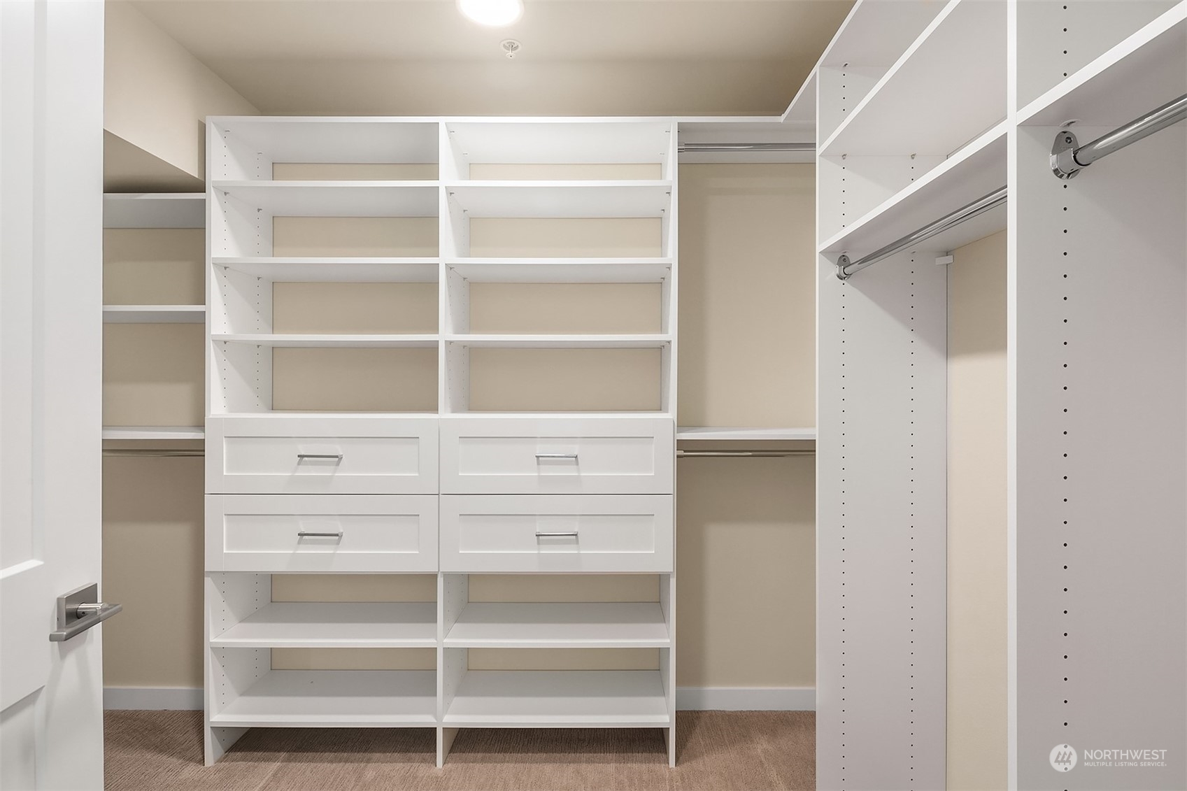 546 Paradise Lane, Unit A202 Edmonds, WA 98020 - Photo 18 of 30 a view of walk in closet with empty racks