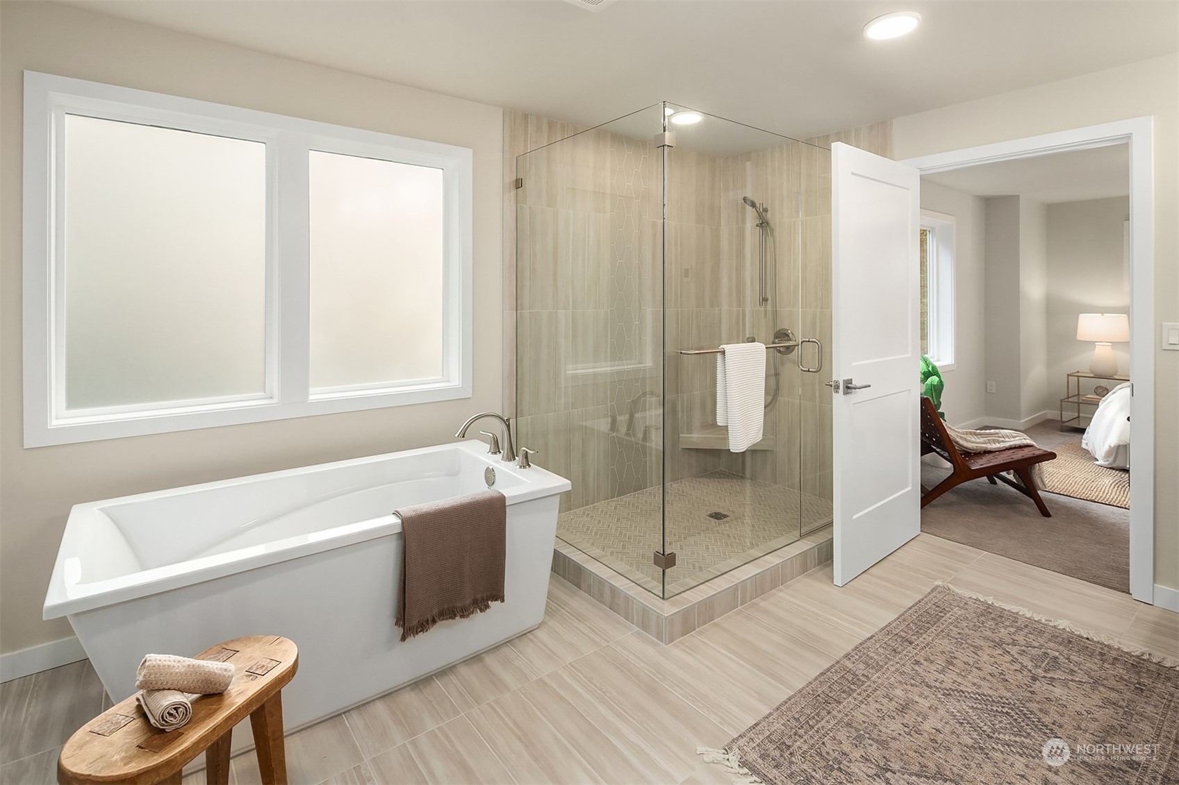 546 Paradise Lane, Unit A202 Edmonds, WA 98020 - Photo 21 of 30 a bathroom with a tub a toilet and a shower