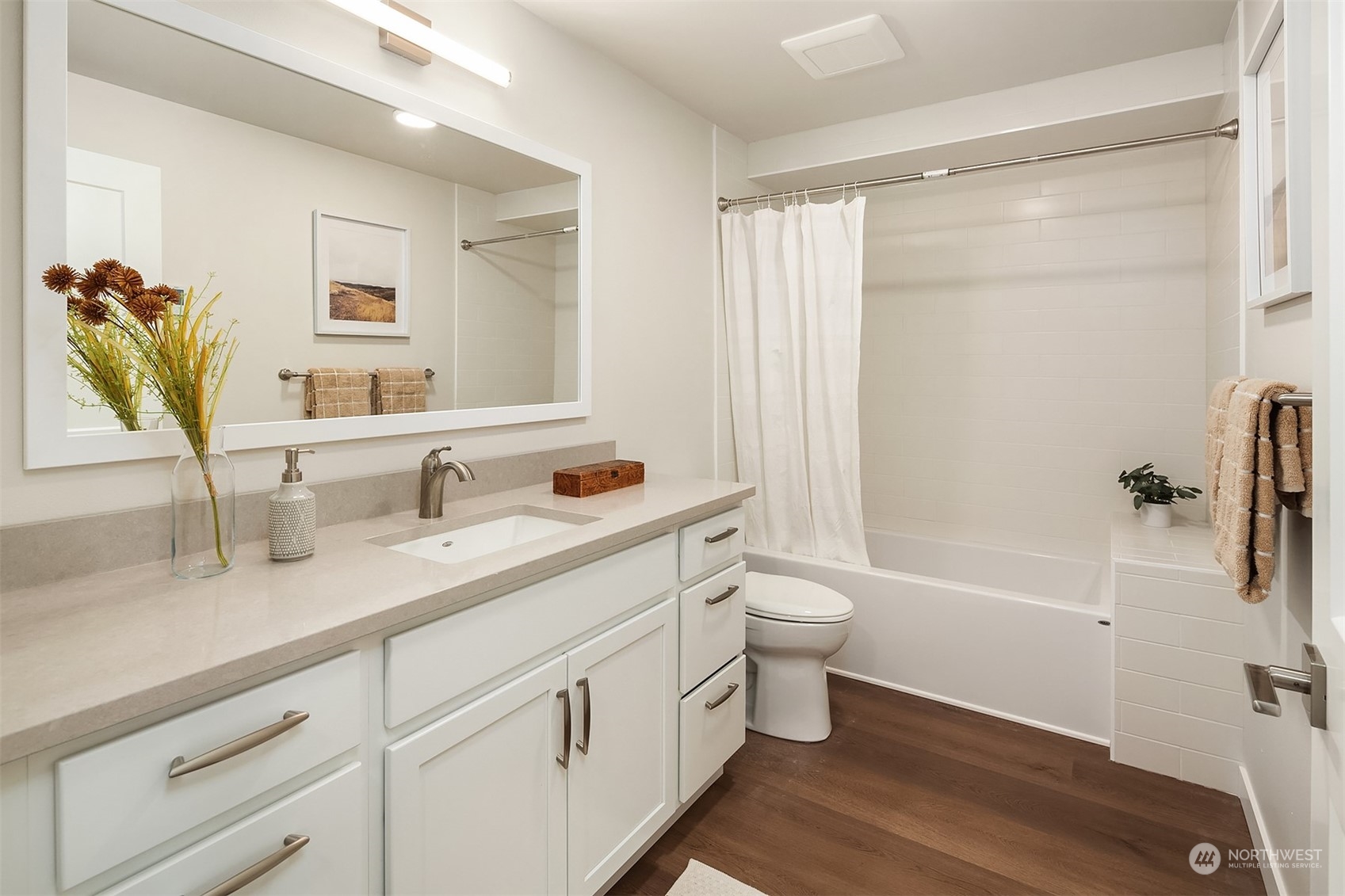 546 Paradise Lane, Unit A202 Edmonds, WA 98020 - Photo 23 of 30 a bathroom with a granite countertop sink toilet and shower