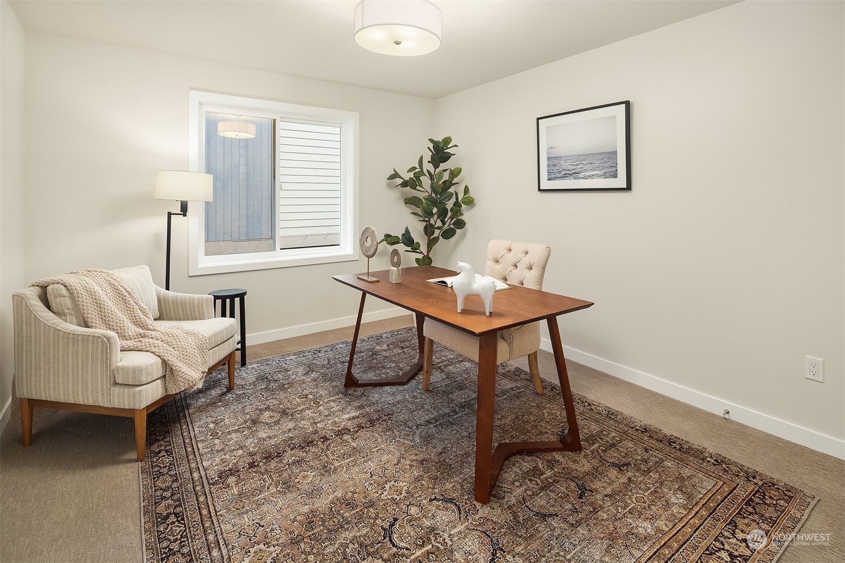 546 Paradise Lane, Unit A202 Edmonds, WA 98020 - Photo 25 of 30 a living room with furniture a window and a table