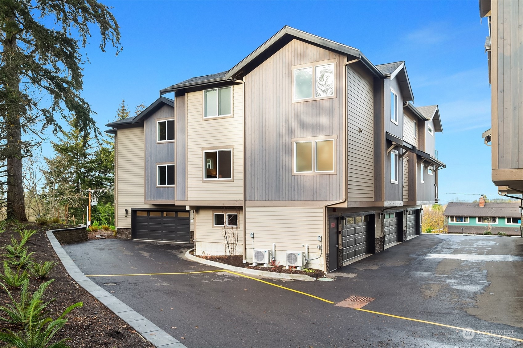 546 Paradise Lane, Unit A202 Edmonds, WA 98020 - Photo 28 of 30 a view of a house with a street