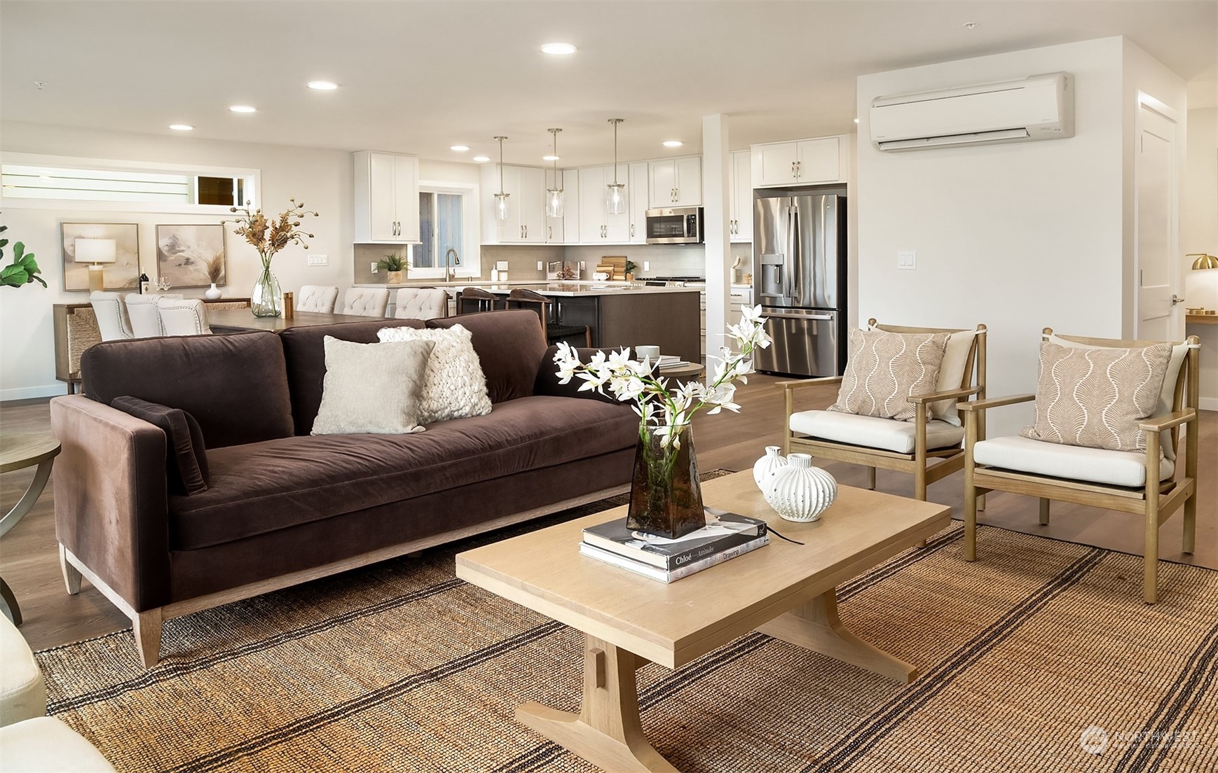 546 Paradise Lane, Unit A202 Edmonds, WA 98020 - Photo 7 of 30 a living room with furniture kitchen view and a table
