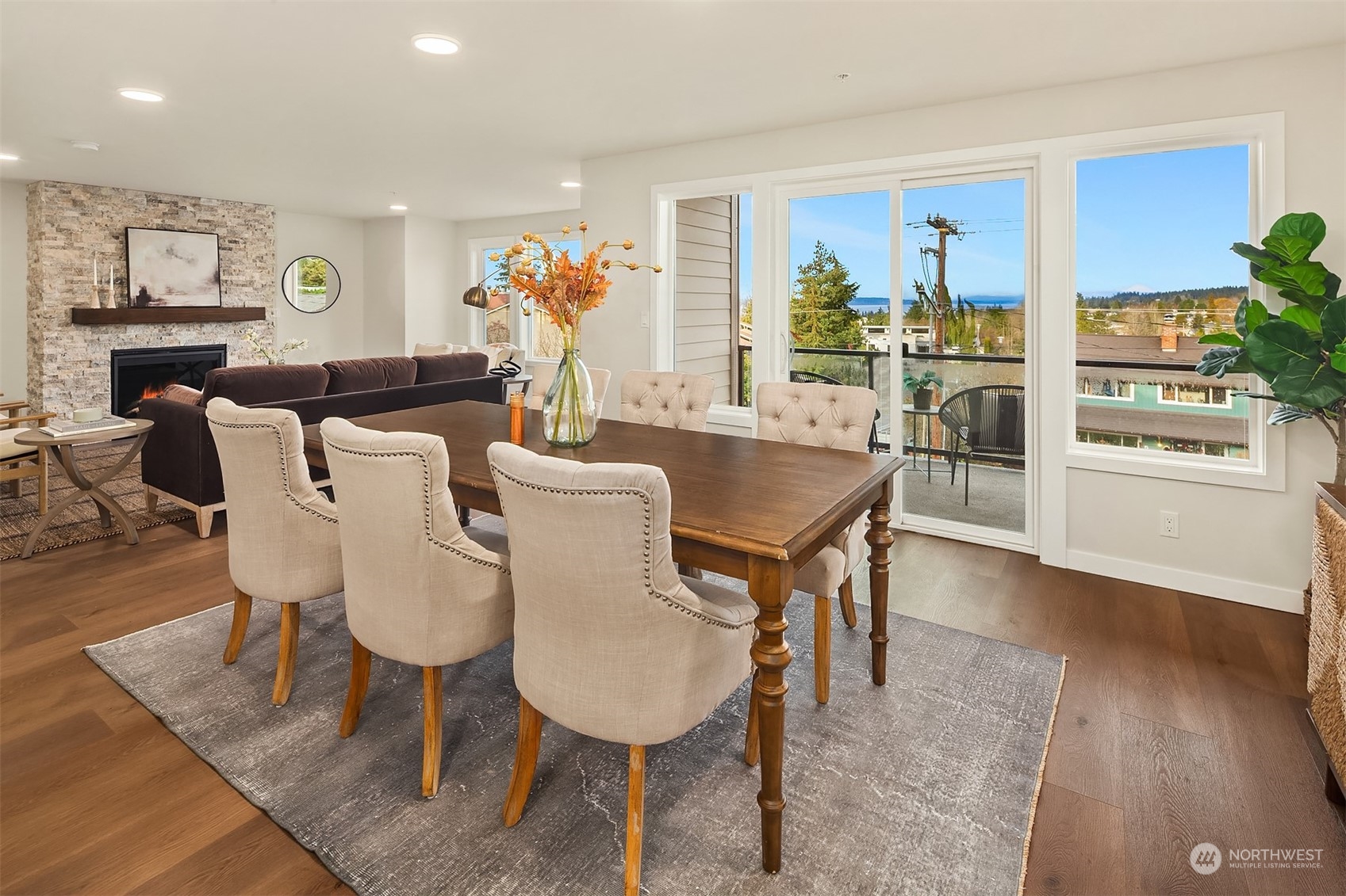 546 Paradise Lane, Unit A202 Edmonds, WA 98020 - Photo 9 of 30 a view of a dining room with furniture window and wooden floor