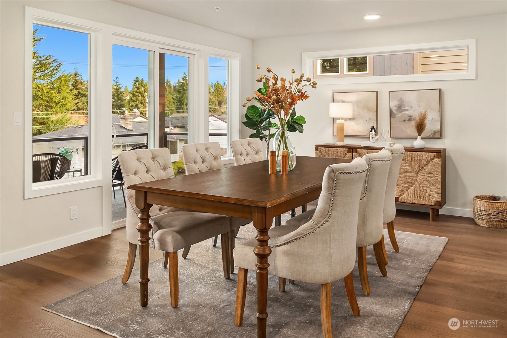 546 Paradise Lane, Unit A202 Edmonds, WA 98020 - Photo 10 of 30 a view of a dining room with furniture window and wooden floor