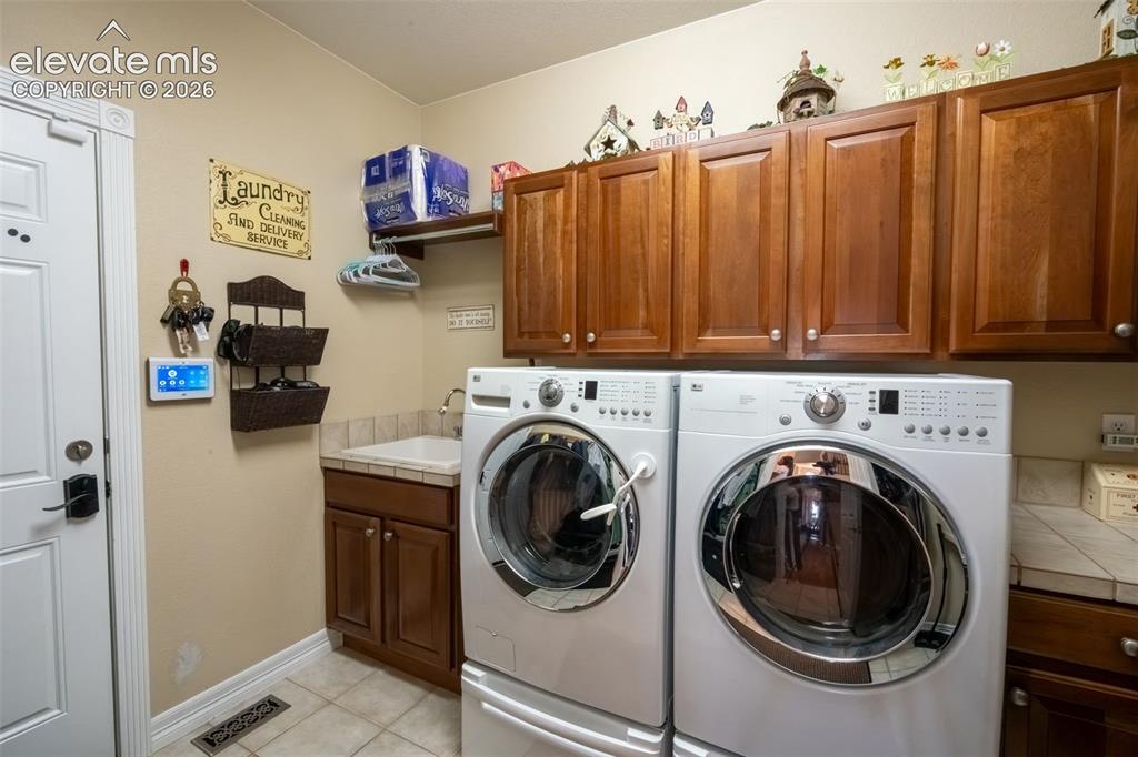 2385 Antelope Ridge Trail Parker, CO 80138 - Photo 28 of 47 MAIN LEVEL LAUNDRY ROOM