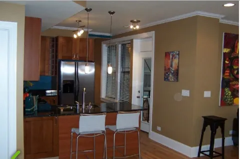 a view of dining room with furniture and wooden floor